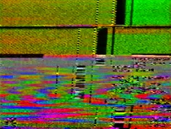 A colorful, abstract, pixelated image that gives the impression of wavy tv static.