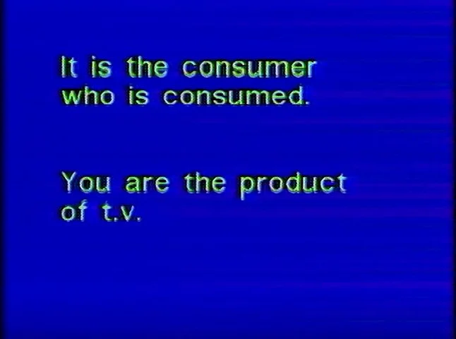 Richard Serra and Carlotta Schoolman's Television Delivers People. A blue screen with yellow text that reads: it is the consumer who is consumed. you are the product of t.v.